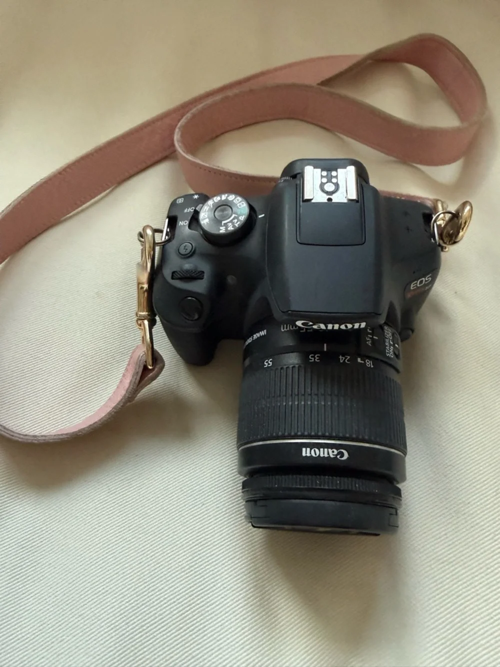 Canon DSLR Camera in Black with Brown Strap and 18-55mm Lens